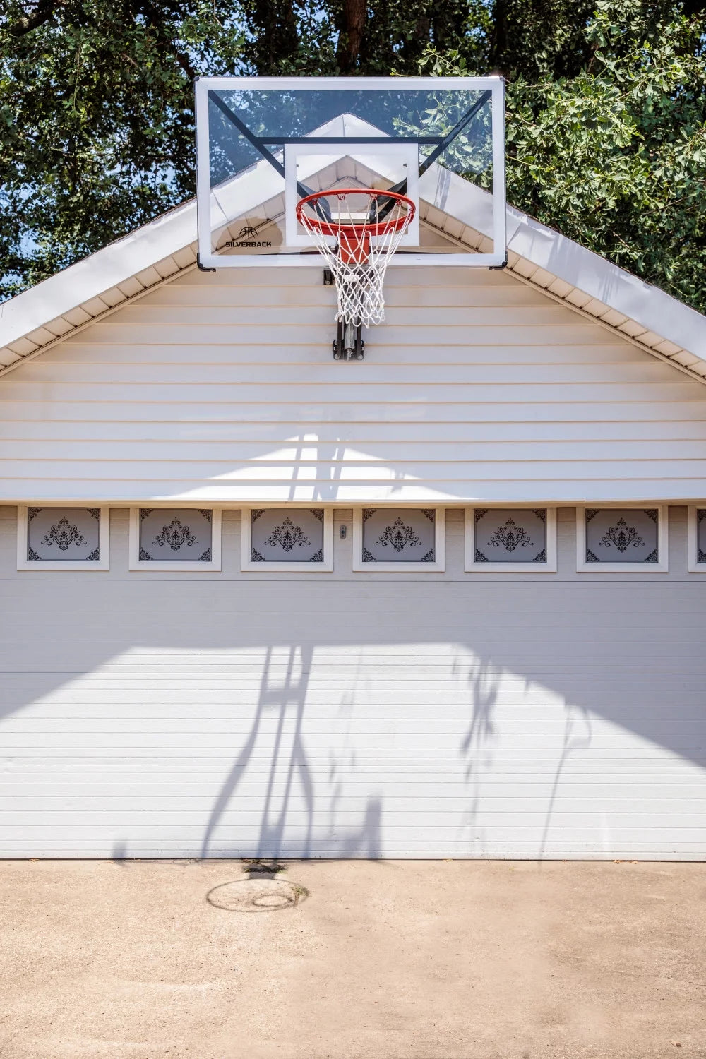 Silverback SBX 54" Wall Mounted Adjustable-Height Basketball Hoop with Quick Play Design